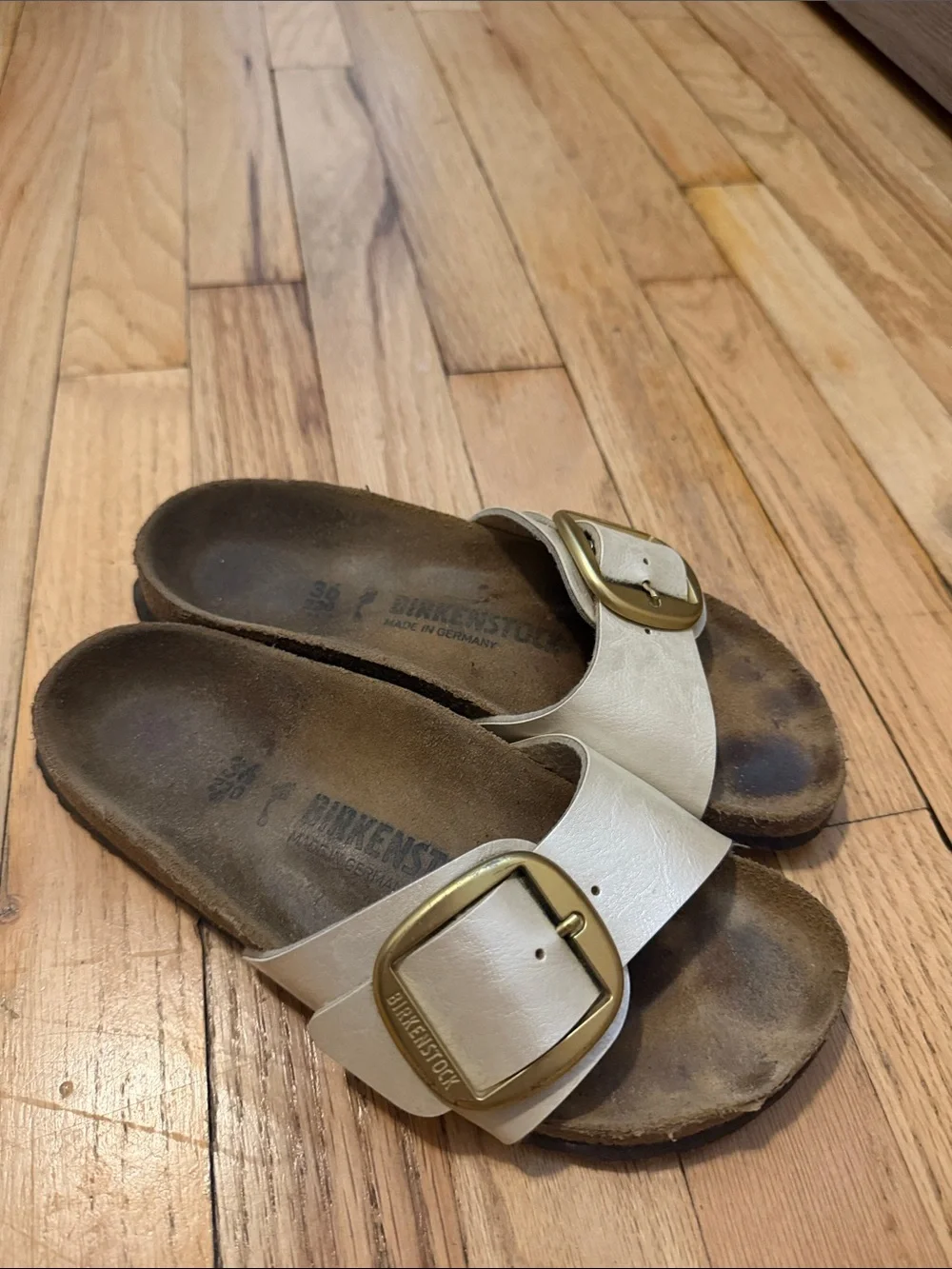 Birkenstock  Cream Single Buckle Slide Sandals with Gold Buckles